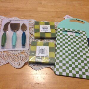 Farmhouse blue and green kitchen tools, cutting boards, cheese knives, coasters